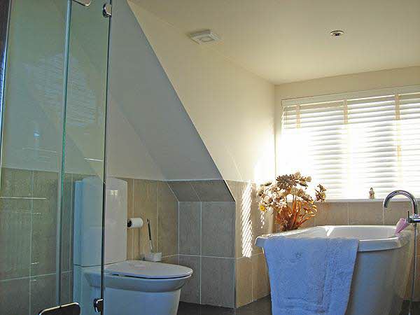 Our bathrooms portfolio shows various shower room, bathroom and en-suite loft conversions